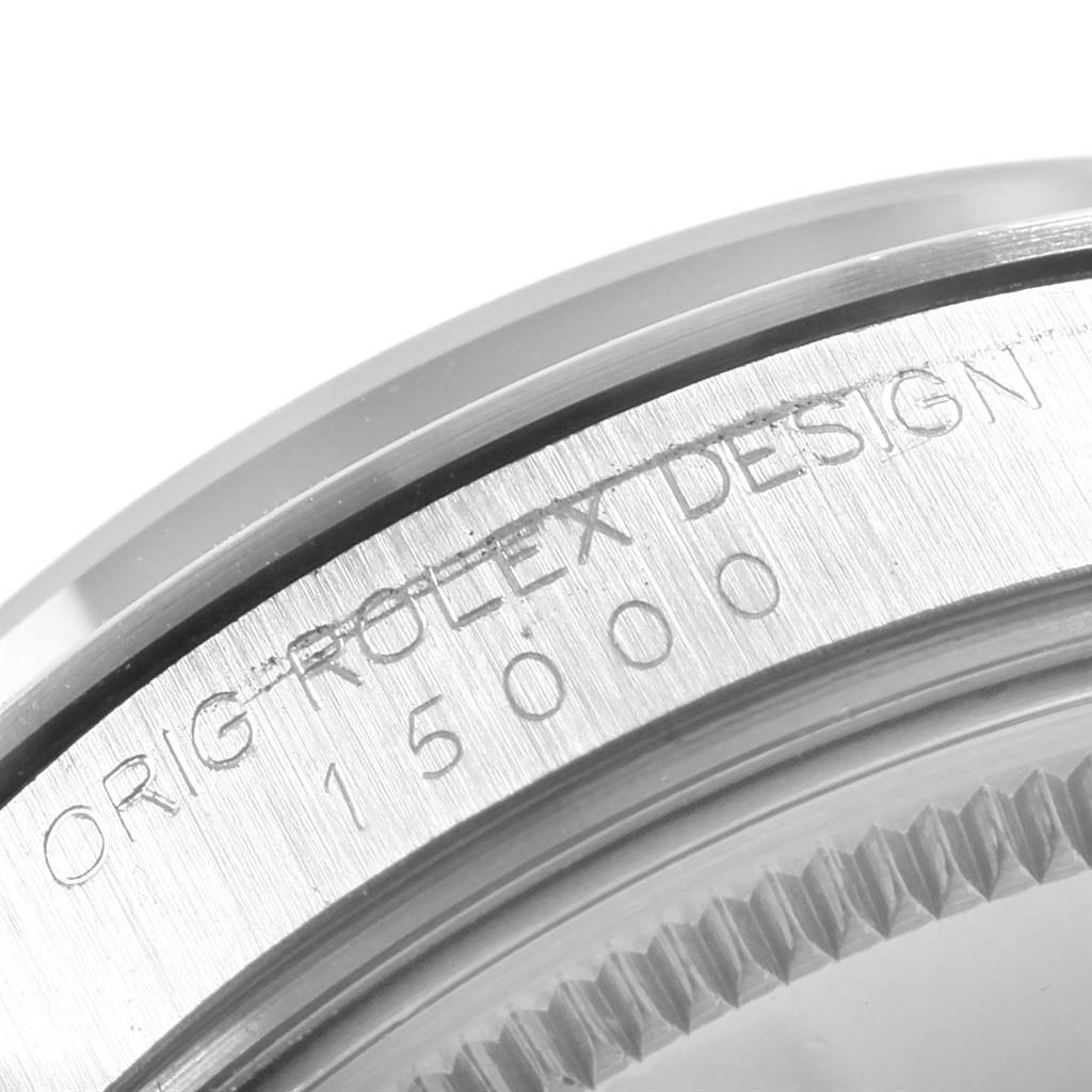 The image shows a close-up of the side of a Vintage Collection Rolex watch, including the etched model number and "ORIG ROLEX DESIGN" inscription.