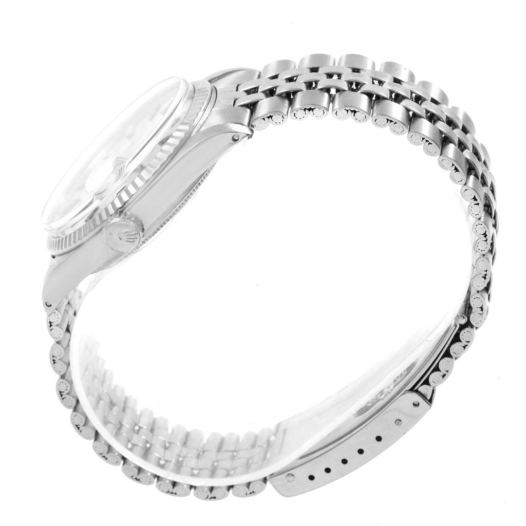 This image shows the side view of the Rolex Vintage Collection 1601 Men's Stainless Steel Silver Dial 1601 Men's Stainless Steel Silver Dial model, highlighting its bezel, crown, and bracelet.