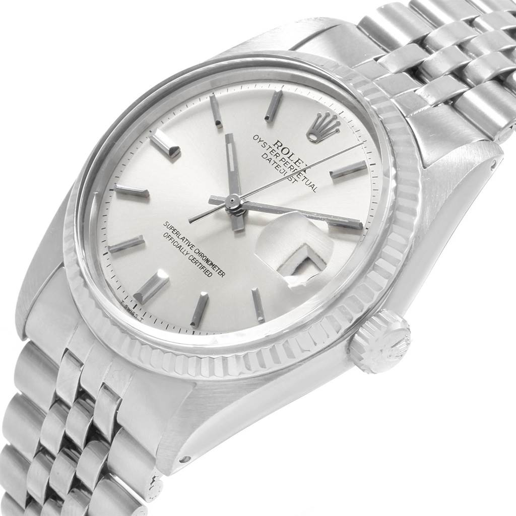 The image shows a close-up of the Rolex Vintage Collection 1601 Men's Stainless Steel Silver Dial 1601 Men's Stainless Steel Silver Dial watch, highlighting its face, bezel, and bracelet at an angled view.