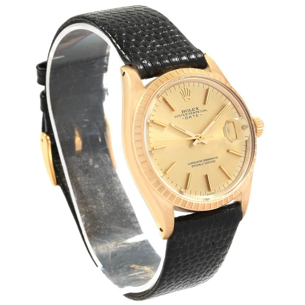 This Rolex Vintage Collection 1503 Men
s Yellow Gold Champagne Dial 1503 Men
s Yellow Gold Champagne Dial model is shown at a three-quarter angle, displaying its gold dial, black leather strap, and side crown.