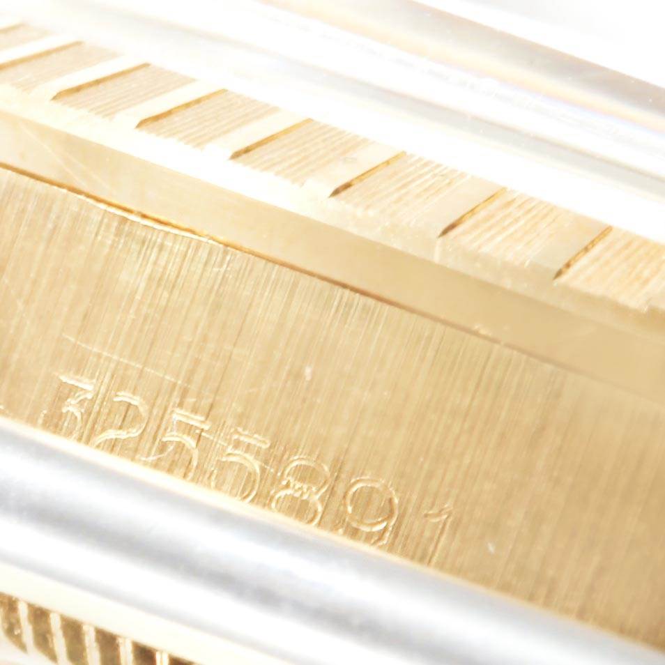 This close-up image shows the side profile and part of the serial number engraving on a Rolex Vintage Collection 1503 Men
s Yellow Gold Champagne Dial 1503 Men
s Yellow Gold Champagne Dial watch.