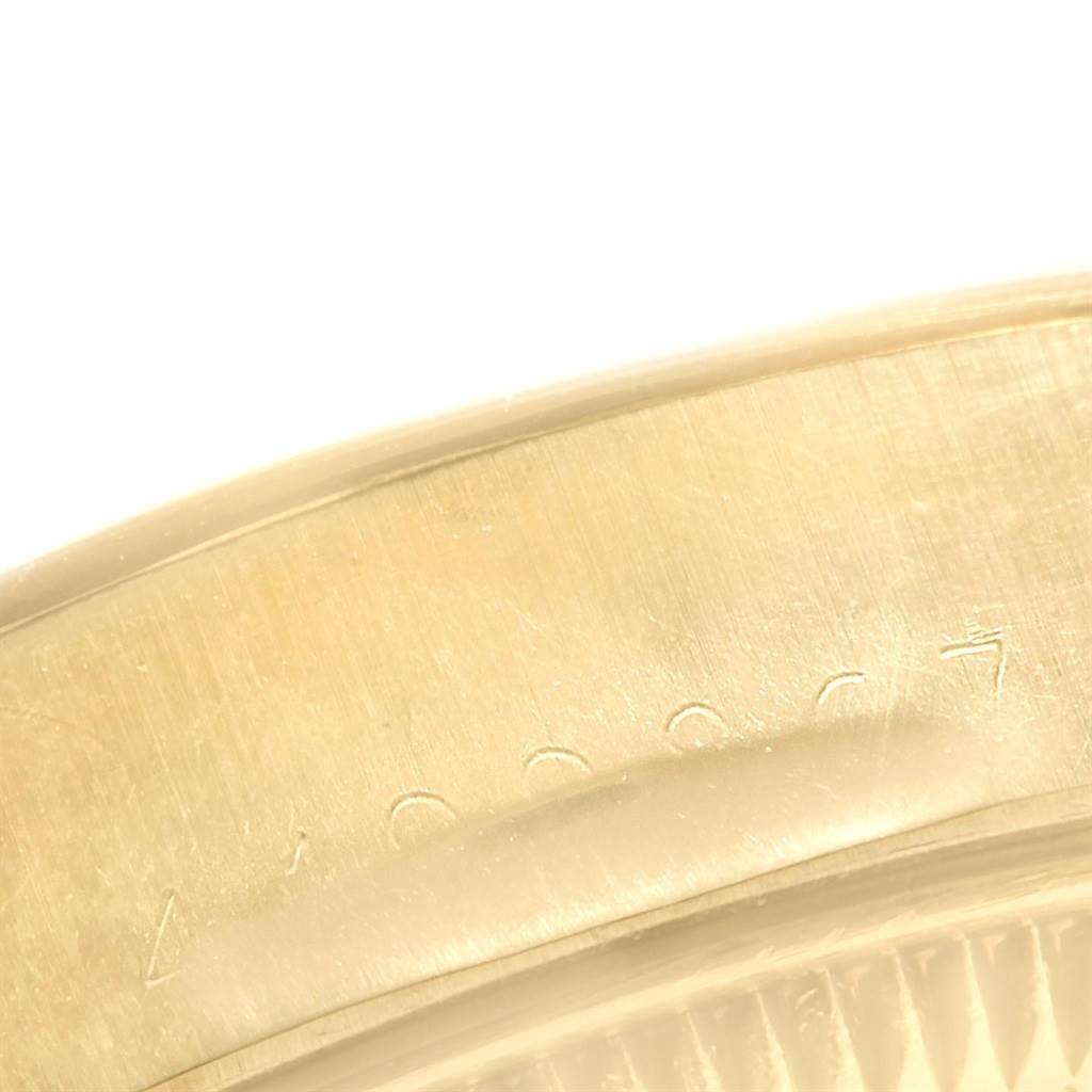This close-up image shows the engraved serial number on the side of the Vintage Collection model by Rolex.