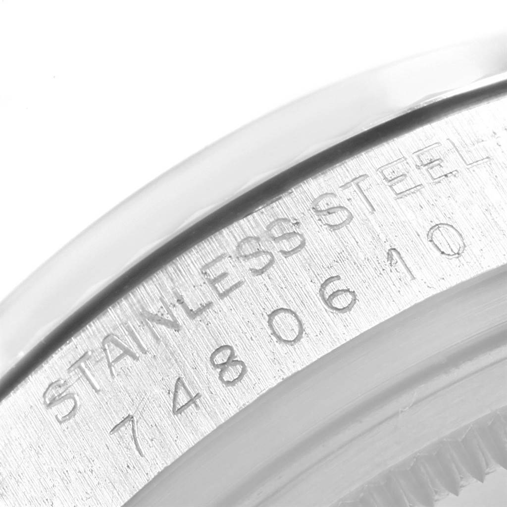 The image shows a close-up of the stainless steel case back with engraving details of the Rolex Vintage Collection 16014 Men
s Stainless Steel Blue Dial 16014 Men
s Stainless Steel Blue Dial watch.