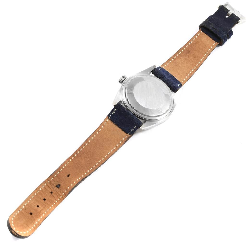 This is the back view of the Rolex Vintage Collection 16014 Men
s Stainless Steel Blue Dial 16014 Men
s Stainless Steel Blue Dial watch showing the case back and leather strap.