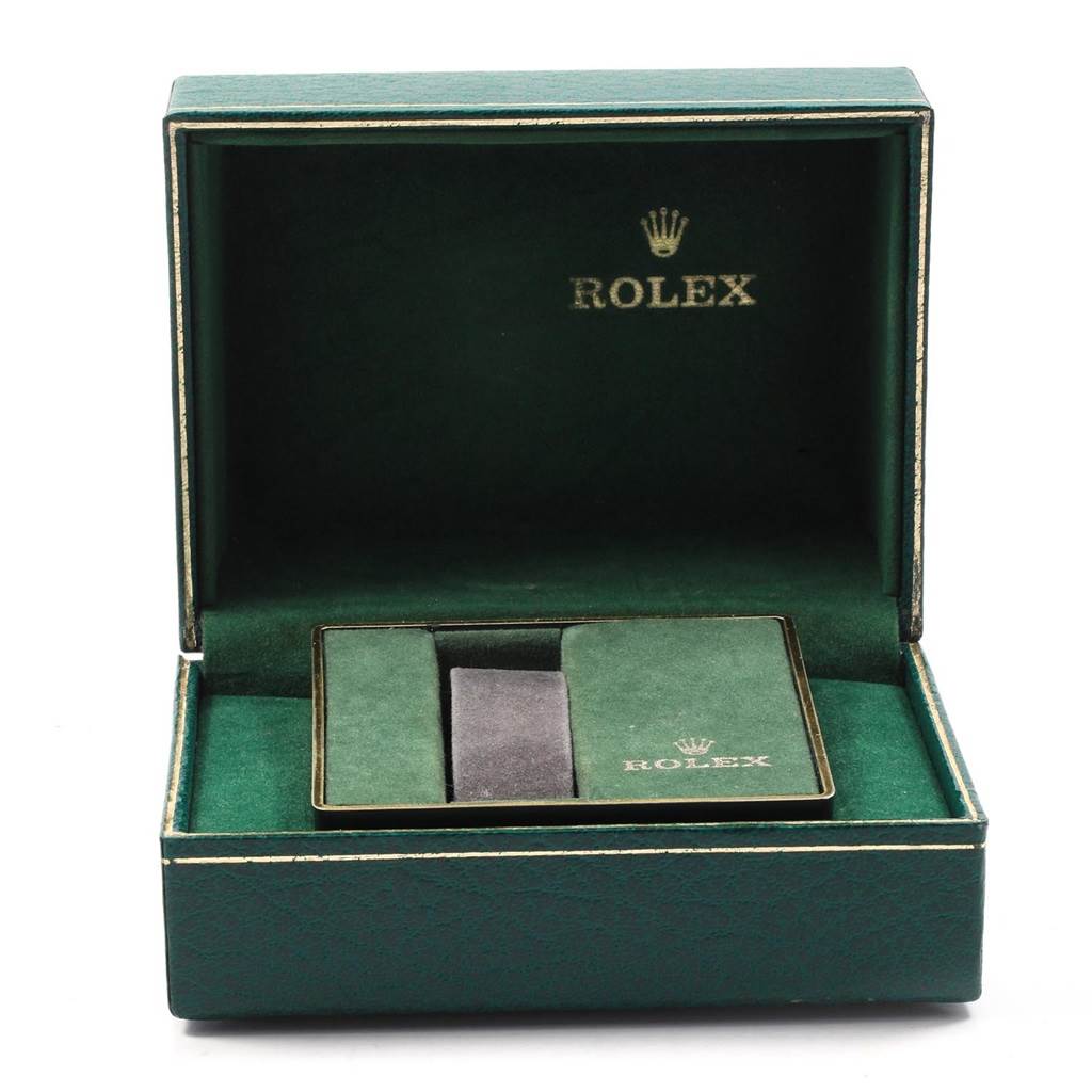 The image shows an open green Rolex watch box from the Vintage Collection model, with a cushion for the watch inside.