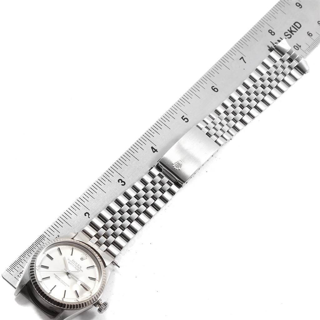 The image shows a Rolex Vintage Collection 1601 Men's Stainless Steel Silver Dial 1601 Men's Stainless Steel Silver Dial watch laid flat with a ruler measuring its silver bracelet.
