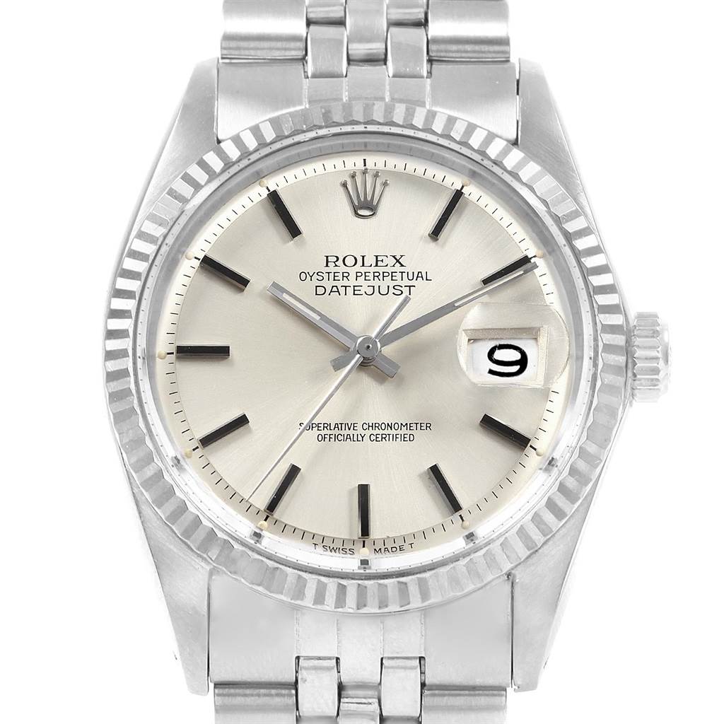 The image shows a close-up of the Rolex Vintage Collection 1601 Men's Stainless Steel Silver Dial 1601 Men's Stainless Steel Silver Dial Datejust watch, highlighting the face, bezel, and part of the band.