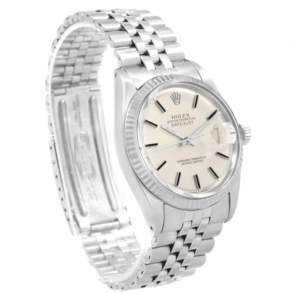 The image shows a side view of a Rolex Vintage Collection 1601 Men's Stainless Steel Silver Dial 1601 Men's Stainless Steel Silver Dial Datejust watch, displaying its dial, bezel, crown, and bracelet.
