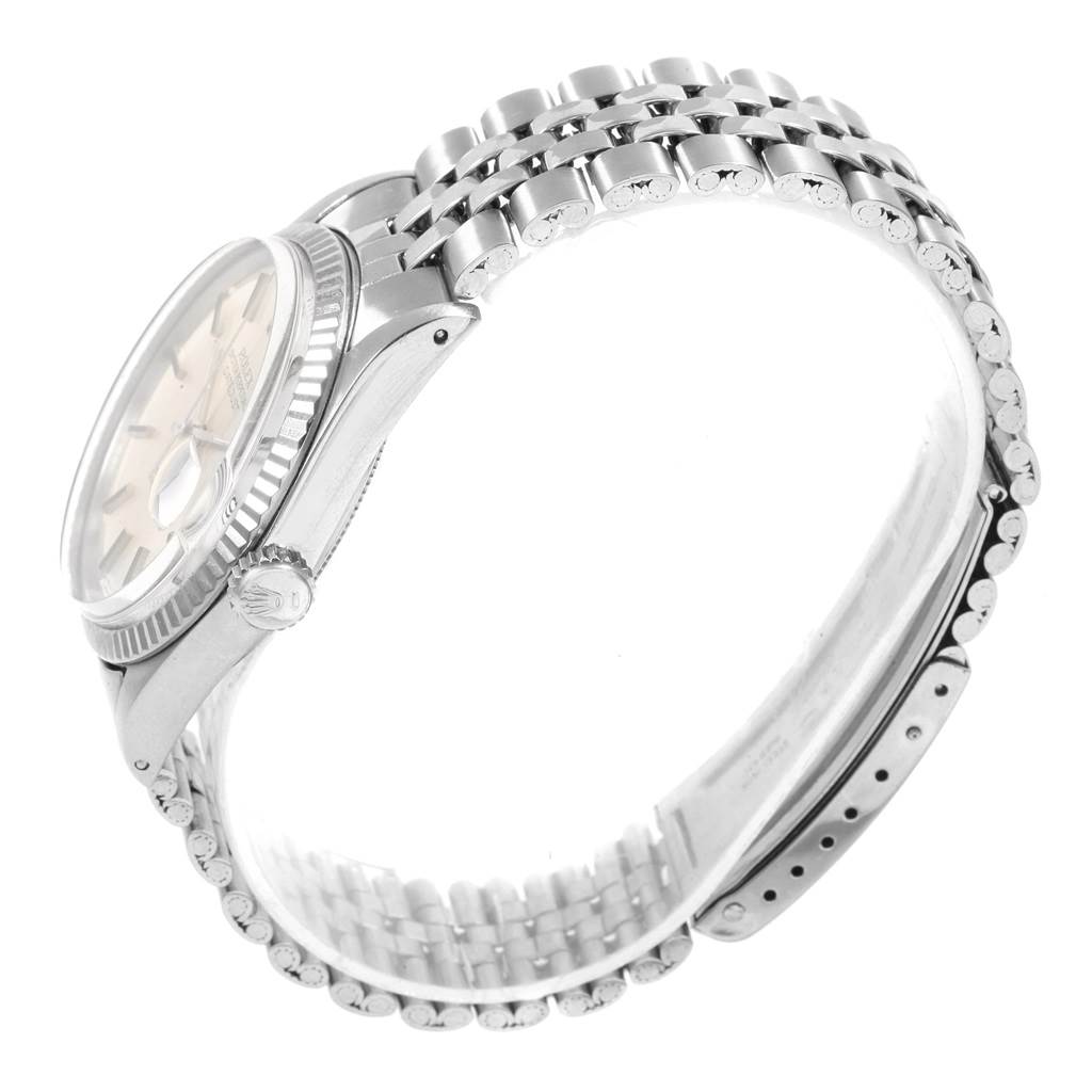 The image shows a side angle of the Rolex Vintage Collection 1601 Men's Stainless Steel Silver Dial 1601 Men's Stainless Steel Silver Dial watch, highlighting the bracelet and part of the case and crown.