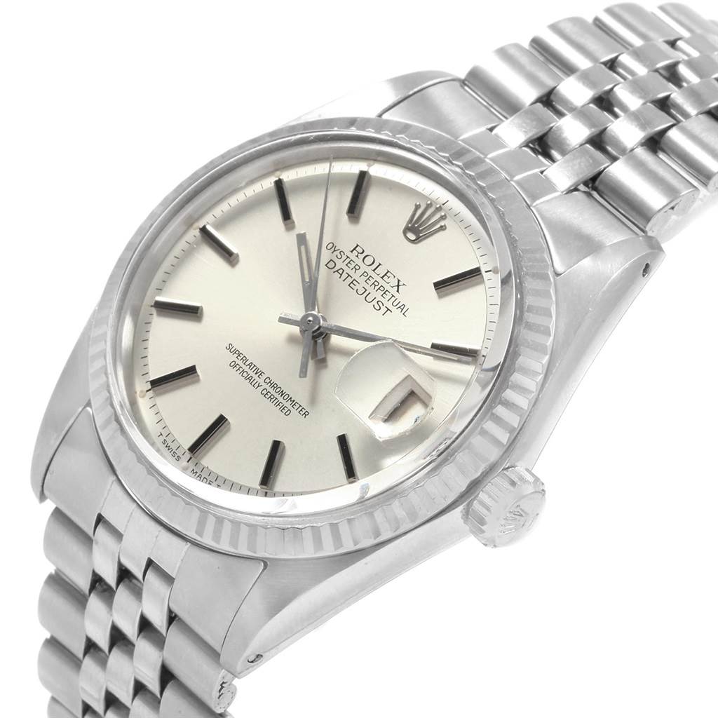 This image shows a Rolex Vintage Collection 1601 Men's Stainless Steel Silver Dial 1601 Men's Stainless Steel Silver Dial Datejust watch at an angle, highlighting its face, bezel, crown, and part of the bracelet.