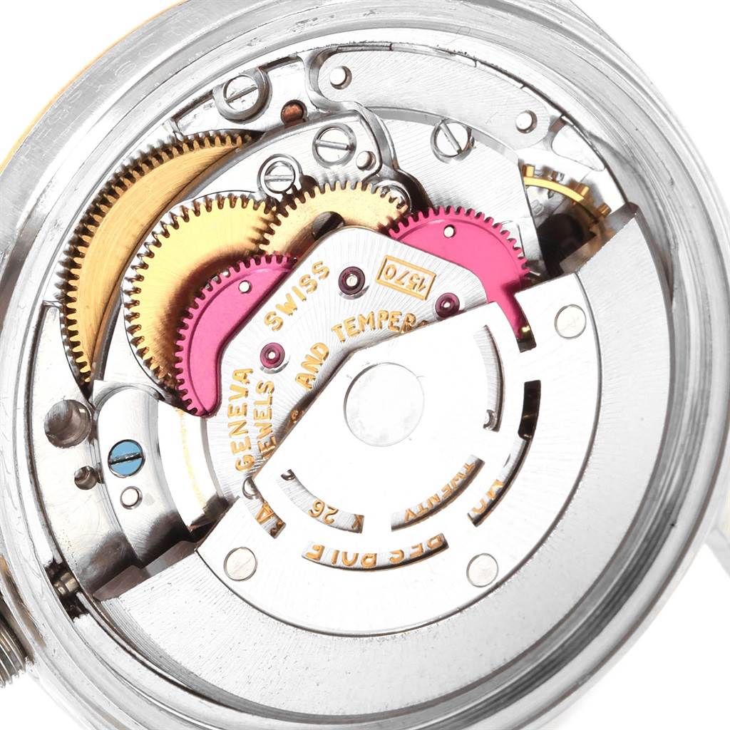 This image shows the intricate movement and internal components of the Rolex Vintage Collection 1601 Men
s Steel and Gold (two tone) Champagne Dial 1601 Men
s Steel and Gold (two tone) Champagne Dial watch taken from a back view angle.