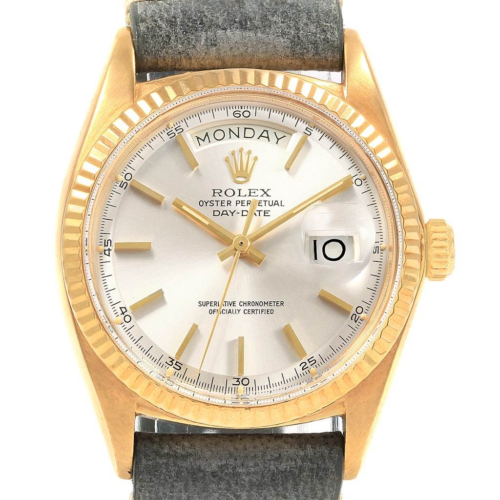 The image shows a front view of a Rolex Vintage Collection 1803 Men
s Yellow Gold Silver Dial 1803 Men
s Yellow Gold Silver Dial model watch, displaying its dial, gold casing, and leather strap.