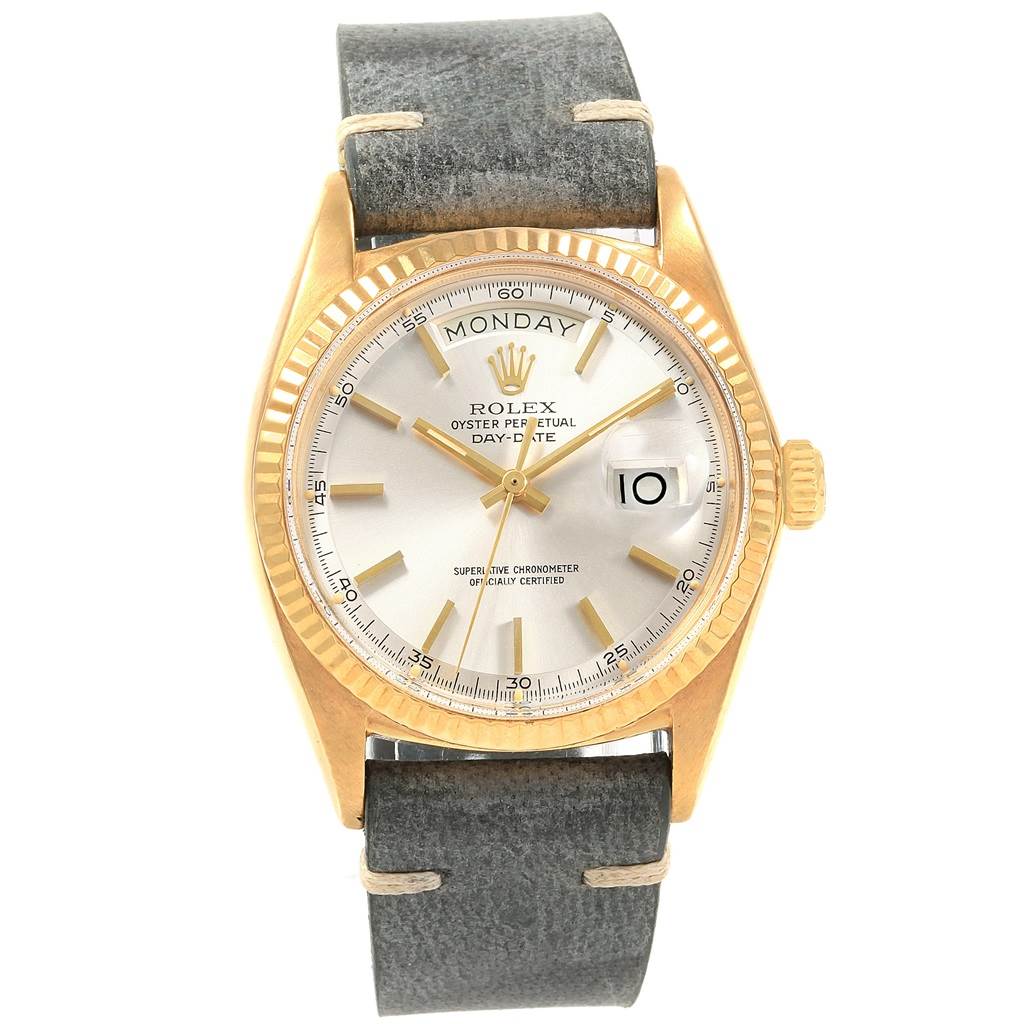 The image shows a front view of the Rolex Vintage Collection 1803 Men
s Yellow Gold Silver Dial 1803 Men
s Yellow Gold Silver Dial Oyster Perpetual Day-Date watch with the dial, hands, and leather strap visible.