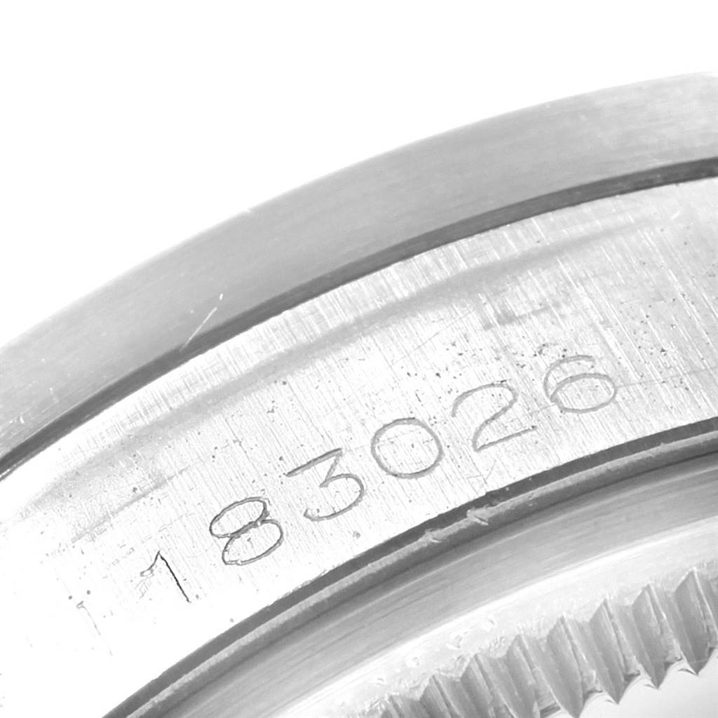 This image shows a close-up of the engraved serial number on the back case of a Rolex Vintage Collection 1501 Men
s Stainless Steel Silver Dial 1501 Men
s Stainless Steel Silver Dial watch.