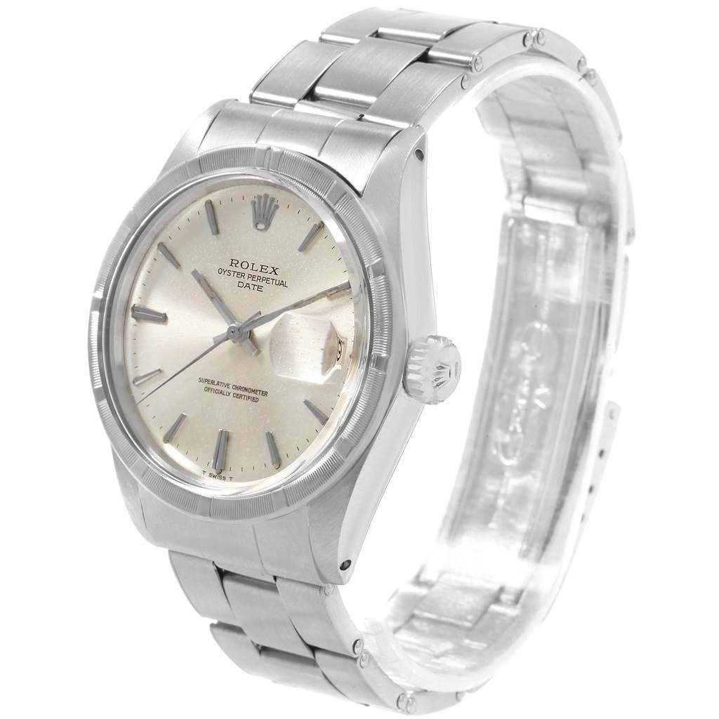 The Vintage Collection Rolex watch is shown at a three-quarter angle, displaying its dial, crown, and stainless steel bracelet.