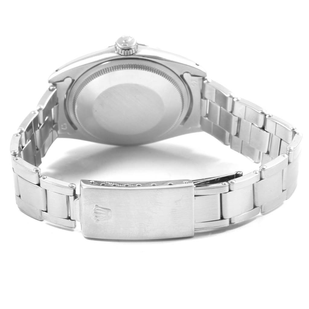 The image shows the back case and clasp of the Rolex Vintage Collection 1500 Men's Stainless Steel Silver Dial 1500 Men's Stainless Steel Silver Dial watch.