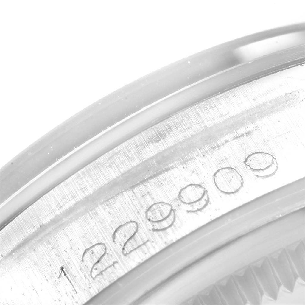 The image shows a close-up detail of the serial number on the case side of a Rolex Vintage Collection 1500 Men's Stainless Steel Silver Dial 1500 Men's Stainless Steel Silver Dial model.