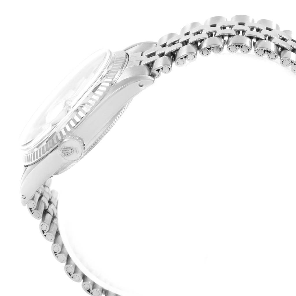 This image shows a side view of the Rolex Vintage Collection 1601 Men's Stainless Steel Silver Dial 1601 Men's Stainless Steel Silver Dial watch, highlighting the bracelet, case, crown, and bezel.