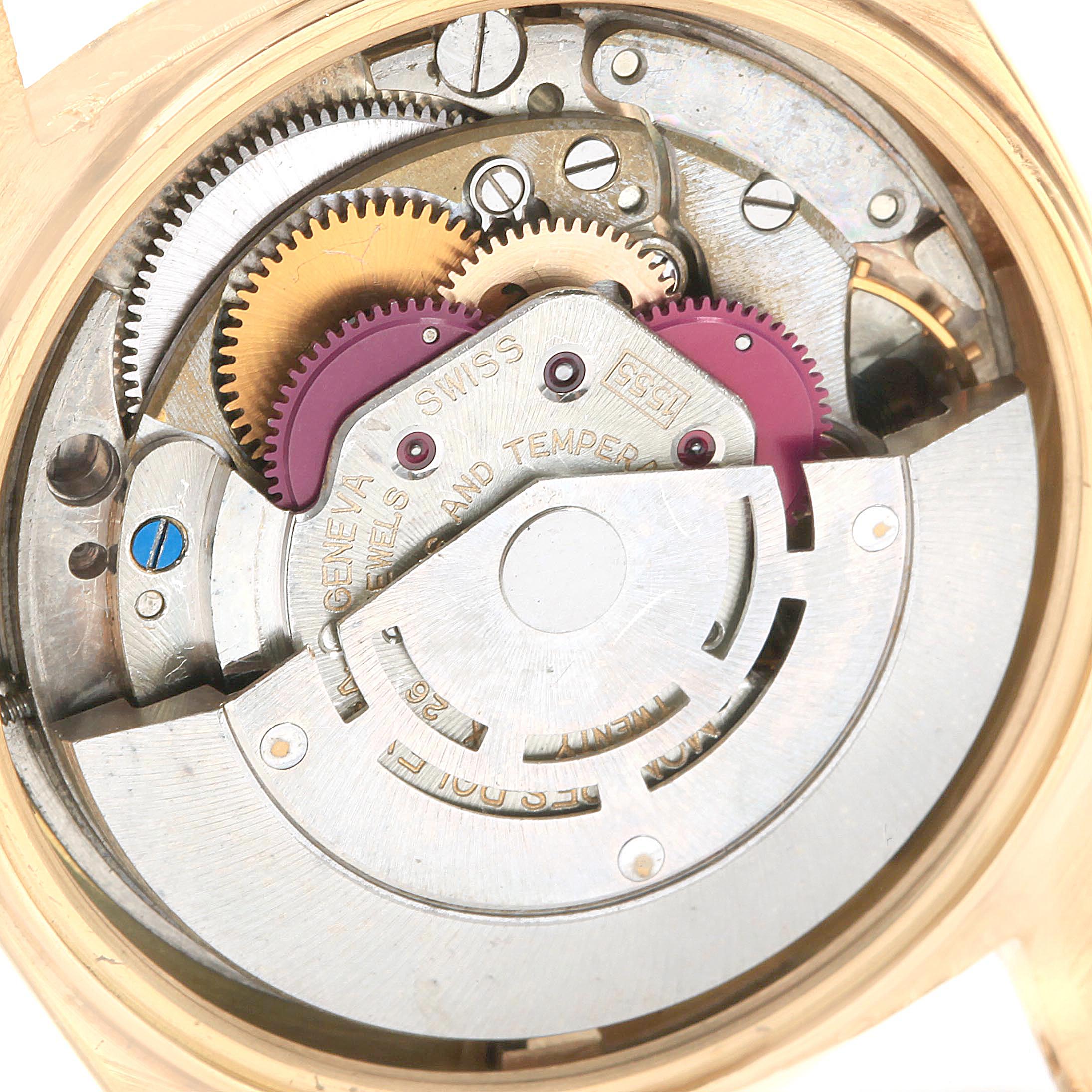 The image shows the internal mechanism and gears of a Vintage Collection model by Rolex from a top-down angle.