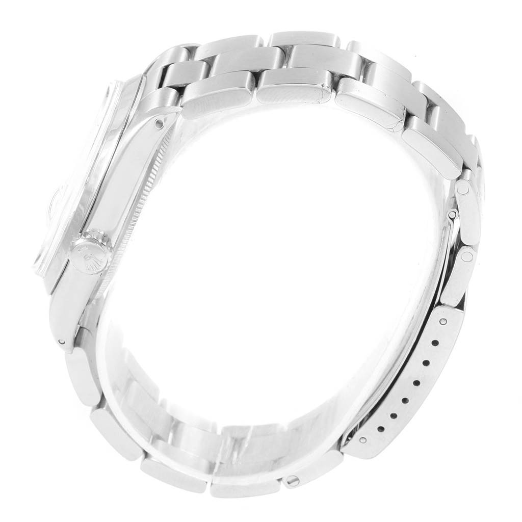 The image shows a side profile of the Rolex Vintage Collection 1500 Men
s Stainless Steel Silver Dial 1500 Men
s Stainless Steel Silver Dial watch, highlighting the bracelet and clasp.