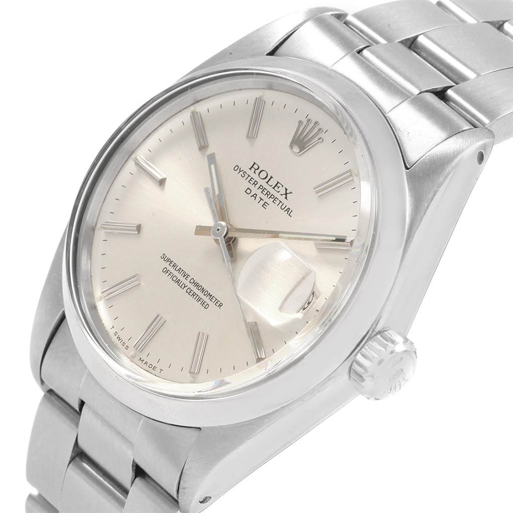 This image shows a close-up angle of the Rolex Vintage Collection 1500 Men
s Stainless Steel Silver Dial 1500 Men
s Stainless Steel Silver Dial Oyster Perpetual Date watch, highlighting its dial, crown, and bracelet.