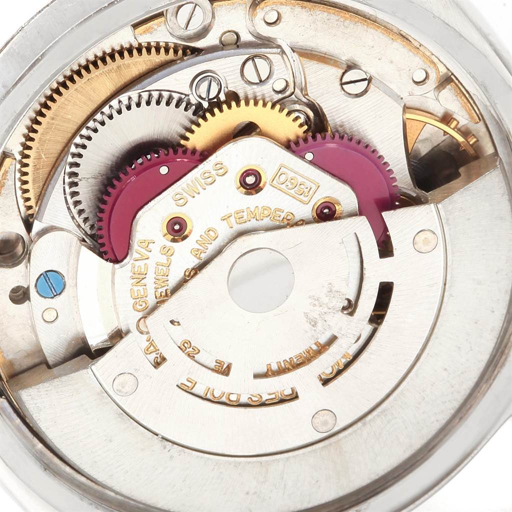 This image shows a close-up of the internal movement components of a Vintage Collection Rolex watch.