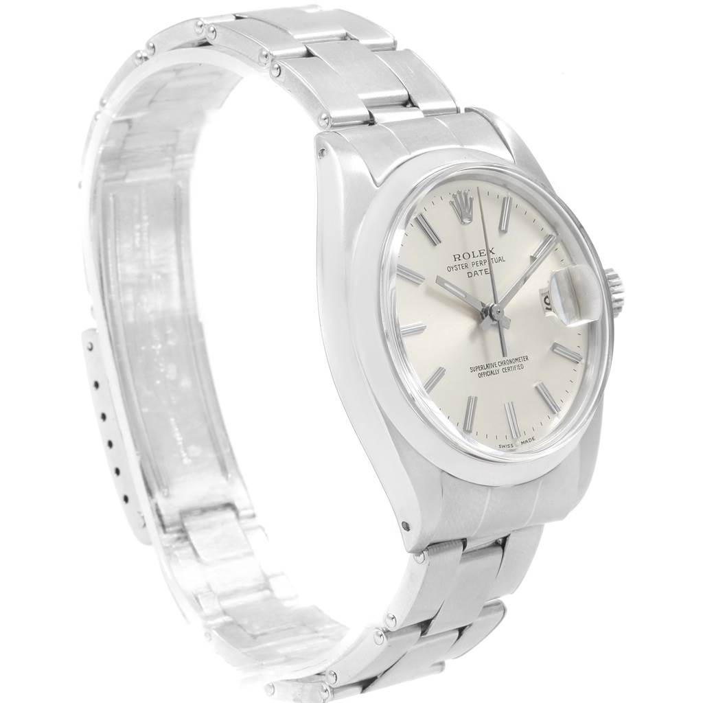 The image shows a side angle of the Rolex Vintage Collection 1500 Men
s Stainless Steel Silver Dial 1500 Men
s Stainless Steel Silver Dial watch, highlighting its face, bezel, bracelet, and clasp.