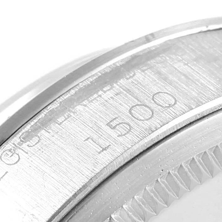 This image shows a close-up of the side of the Rolex Vintage Collection 1500 Men
s Stainless Steel Silver Dial 1500 Men
s Stainless Steel Silver Dial watch case, including the model number 1500.