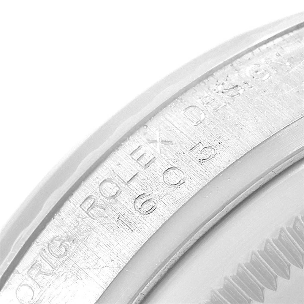 This image shows the edge of the bezel and engraved details on the Vintage Collection model by Rolex.