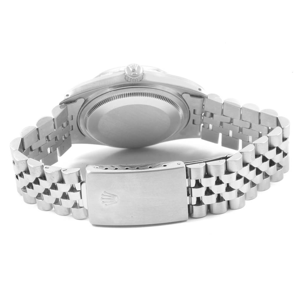 The image shows the back view of a Rolex Vintage Collection 1603 Men
s Stainless Steel Grey Dial 1603 Men
s Stainless Steel Grey Dial watch, including its case back, bracelet, and clasp.