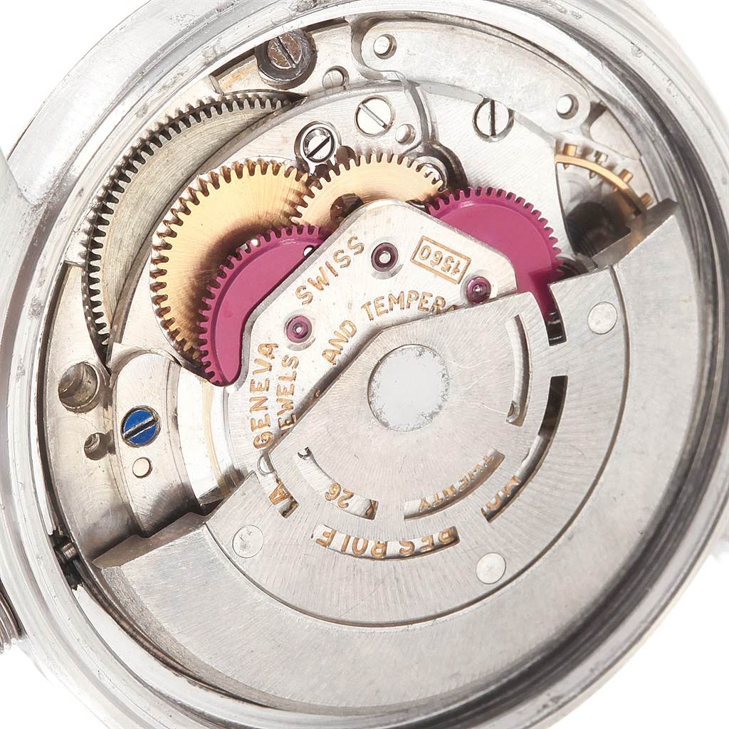 This image shows the intricate internal mechanism of a Rolex Vintage Collection 1601 Men
s Stainless Steel Silver Dial 1601 Men
s Stainless Steel Silver Dial watch from a close-up angle.