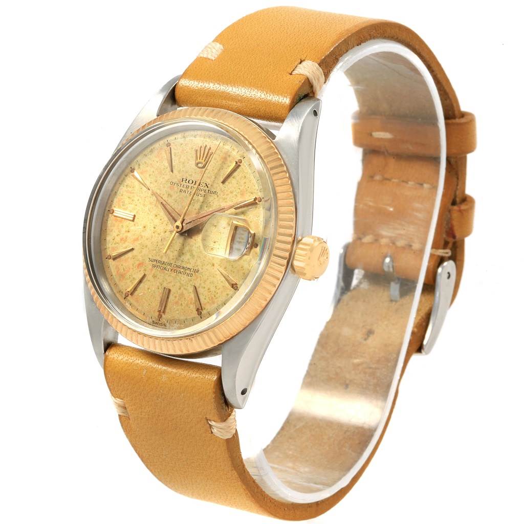 This image shows a Rolex Vintage Collection 1601 Men's Steel and Gold (two tone) Champagne Dial 1601 Men's Steel and Gold (two tone) Champagne Dial watch at a 3/4 angle, highlighting the dial, bezel, crown, and leather strap.