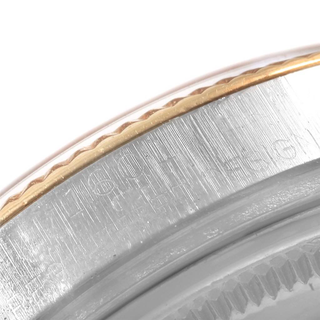 The image shows a close-up, angled view of the bezel and case of a Rolex Vintage Collection 1601 Men's Steel and Gold (two tone) Champagne Dial 1601 Men's Steel and Gold (two tone) Champagne Dial watch.