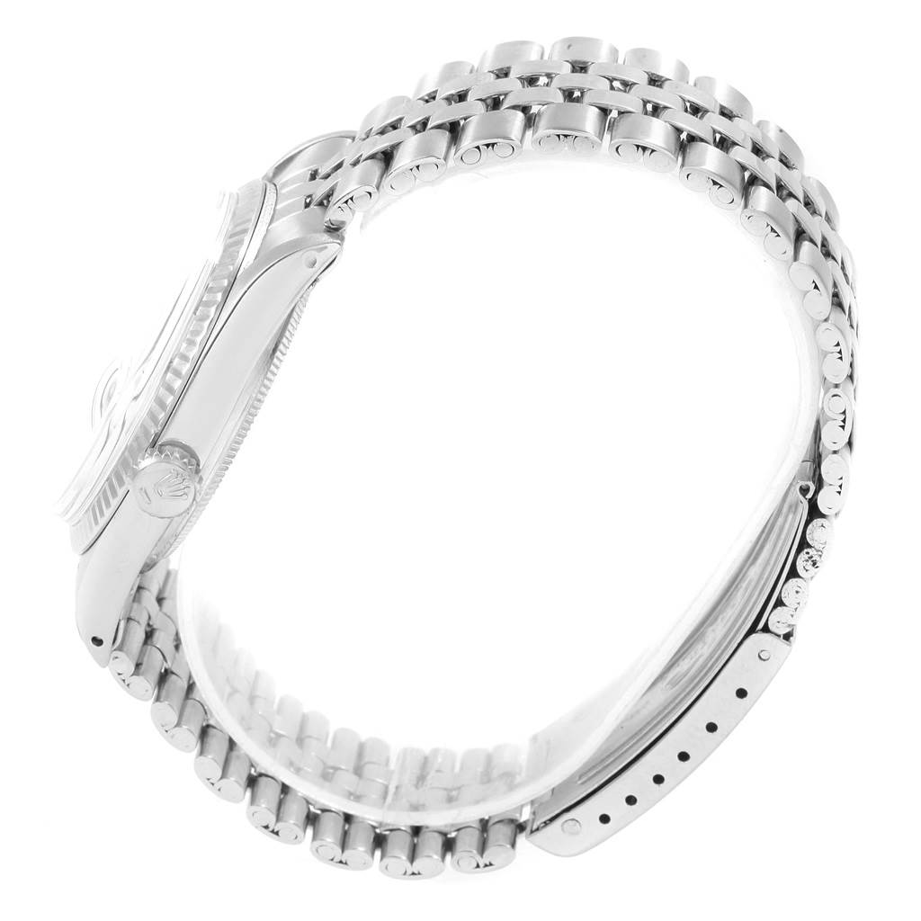 This image shows the side profile of a Rolex Vintage Collection 1601 Men
s Stainless Steel Silver Dial 1601 Men
s Stainless Steel Silver Dial watch, highlighting the case, crown, and part of the bracelet.