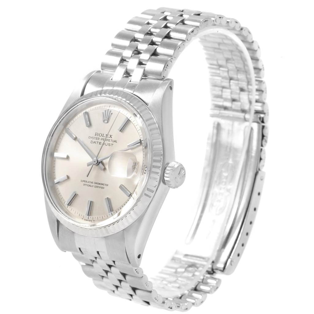 The image shows a side view of a Rolex Vintage Collection 1601 Men
s Stainless Steel Silver Dial 1601 Men
s Stainless Steel Silver Dial Datejust watch, highlighting its face, bezel, crown, and bracelet.