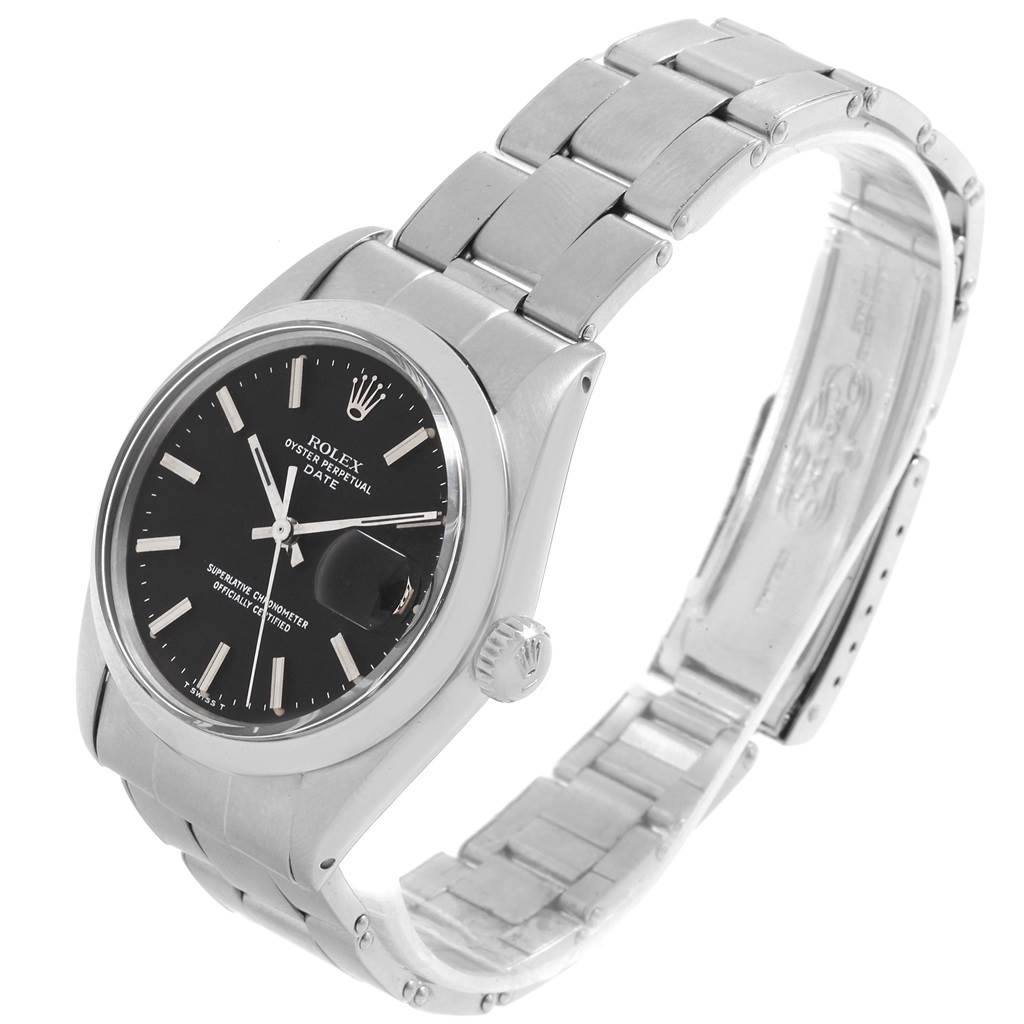 The image shows a side angle of the Rolex Vintage Collection 1500 Men's Stainless Steel Black Dial 1500 Men's Stainless Steel Black Dial watch, highlighting the dial, crown, and stainless steel bracelet.