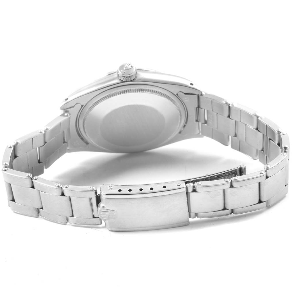 This image shows the back of the Rolex Vintage Collection 1500 Men's Stainless Steel Black Dial 1500 Men's Stainless Steel Black Dial watch, focusing on the case, crown, and stainless steel bracelet with clasp.