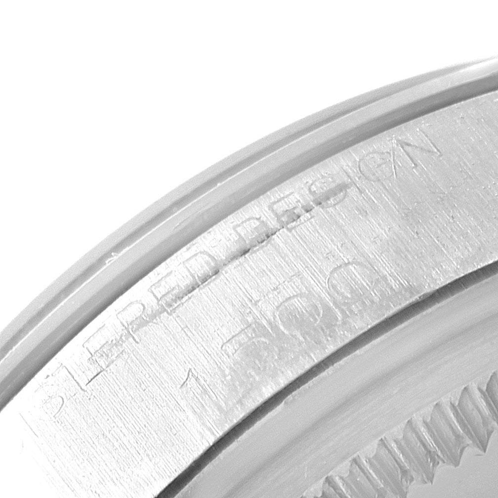 This image shows a close-up view of the engraved rim of a Rolex Vintage Collection 1500 Men's Stainless Steel Black Dial 1500 Men's Stainless Steel Black Dial watch bezel.