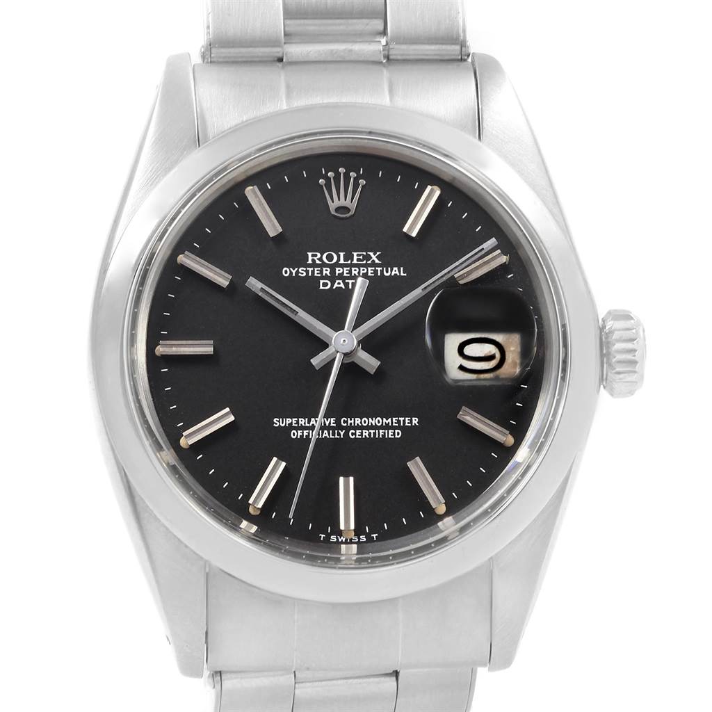 The image shows a front view of a Rolex Vintage Collection 1500 Men's Stainless Steel Black Dial 1500 Men's Stainless Steel Black Dial Oyster Perpetual Date watch, highlighting its black dial and date window.