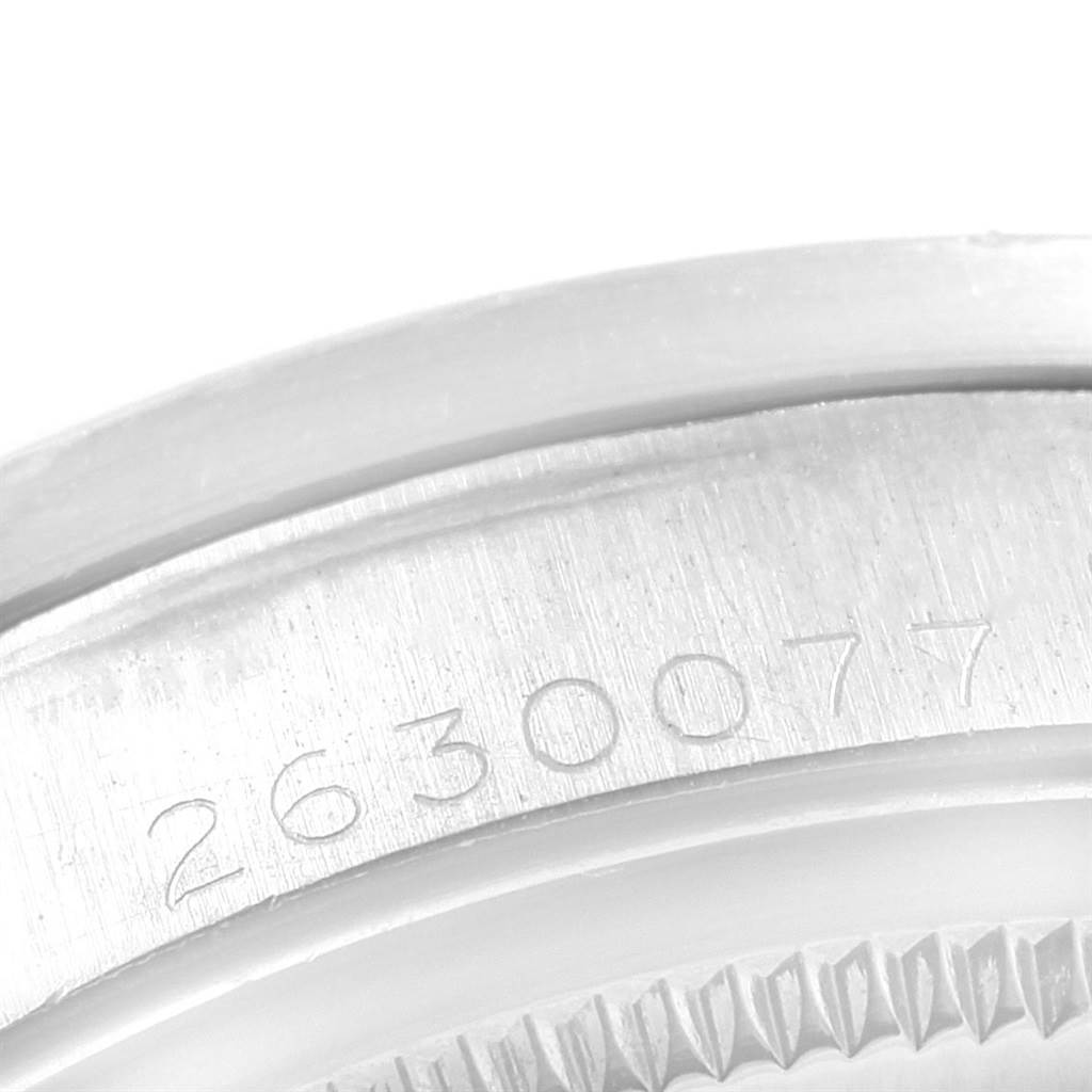This image shows the side of the case with the serial number engraved on a Vintage Collection model by Rolex.