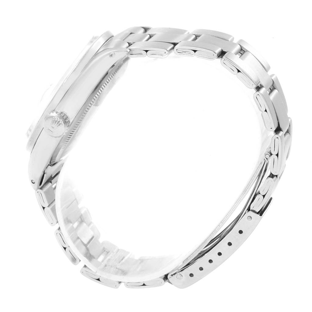 The image shows a side view and partial bracelet of the Rolex Vintage Collection 1501 Men's Stainless Steel Silver Dial 1501 Men's Stainless Steel Silver Dial model watch.