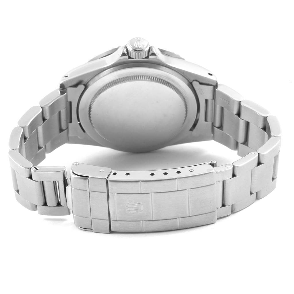 The image shows the back case and metal bracelet of the Vintage Collection Rolex watch from a rear angle.