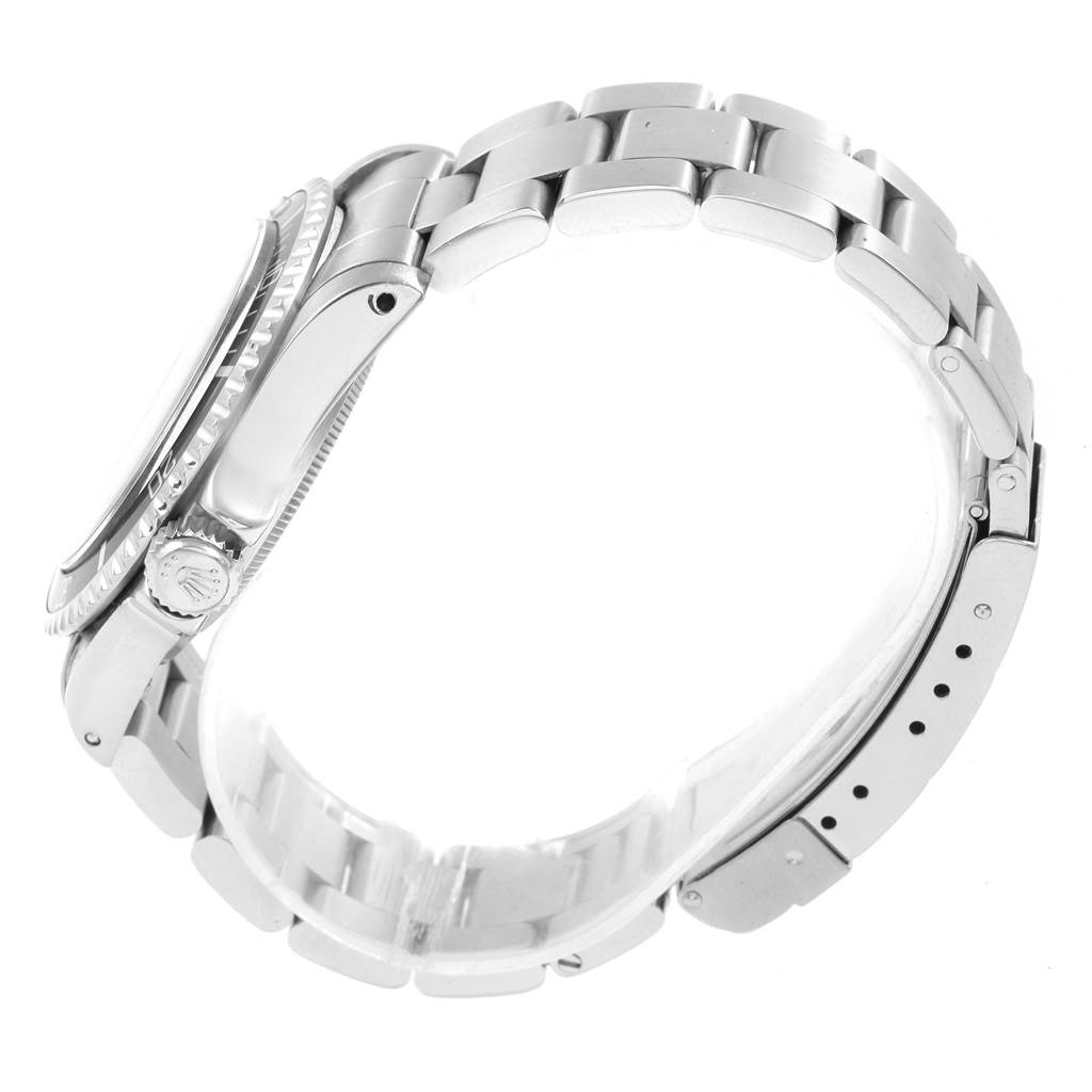 The image shows a side view of the stainless steel bracelet and crown of a Rolex Vintage Collection 5513 Men's Stainless Steel Black Dial 5513 Men's Stainless Steel Black Dial model watch.