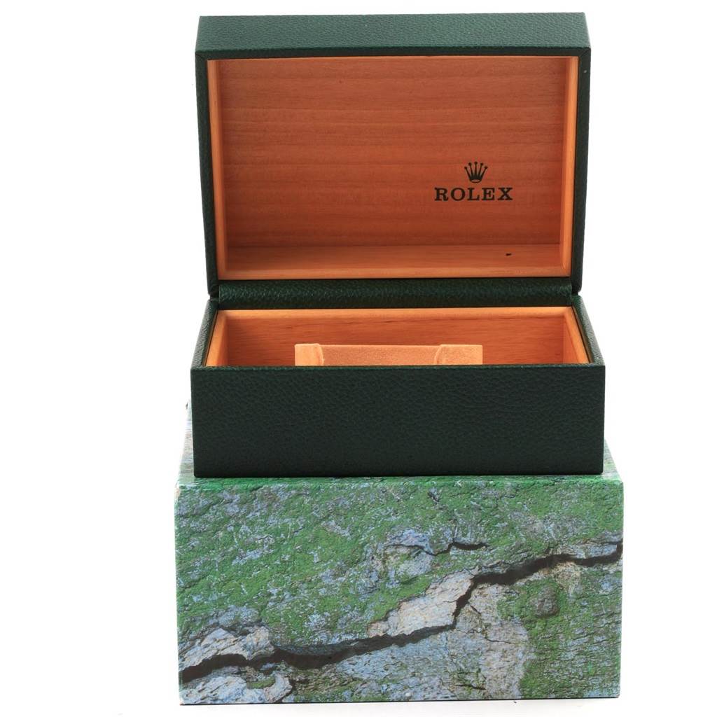 This image shows an open green and wood Rolex Vintage Collection 5513 Men's Stainless Steel Black Dial 5513 Men's Stainless Steel Black Dial watch box from a front angle.