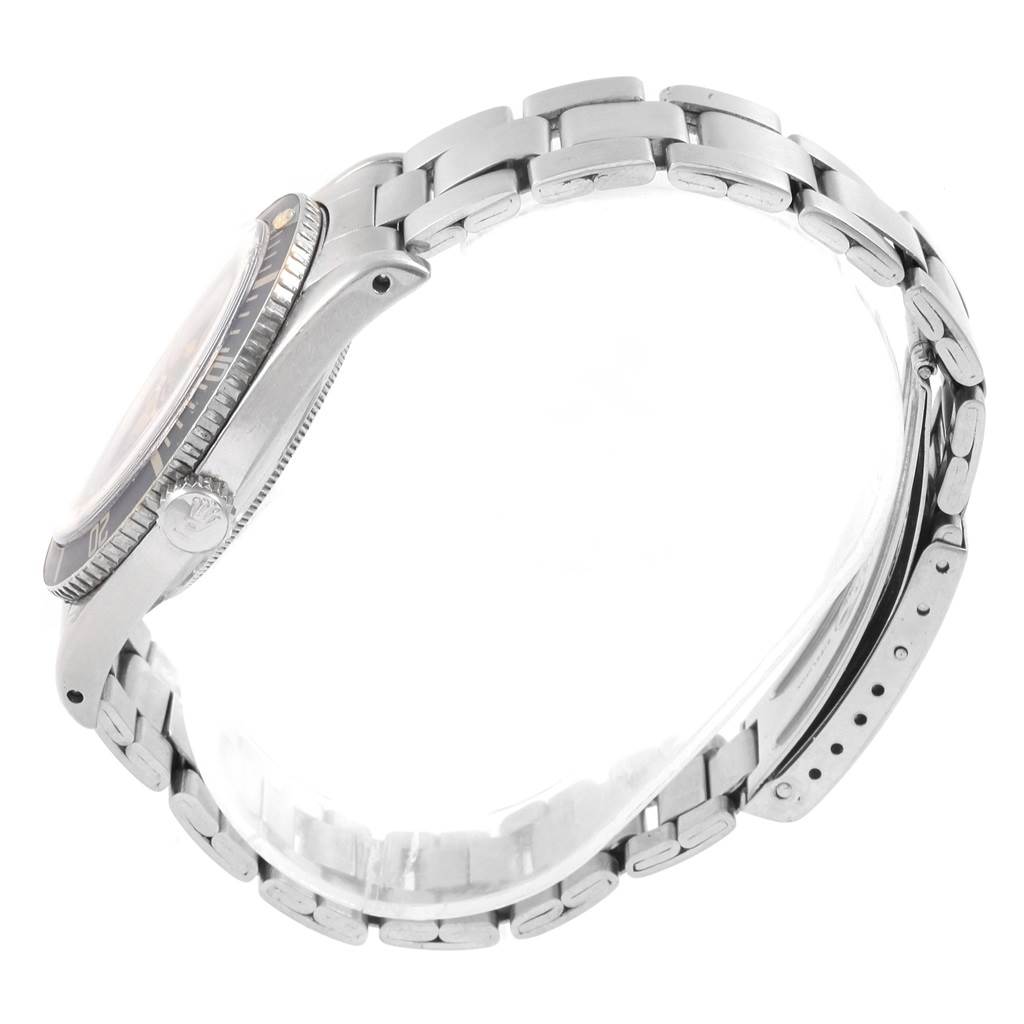 The image shows a side view of a Rolex Vintage Collection 5508 Men's Stainless Steel Black Dial 5508 Men's Stainless Steel Black Dial watch, highlighting the case, bezel, crown, and bracelet.