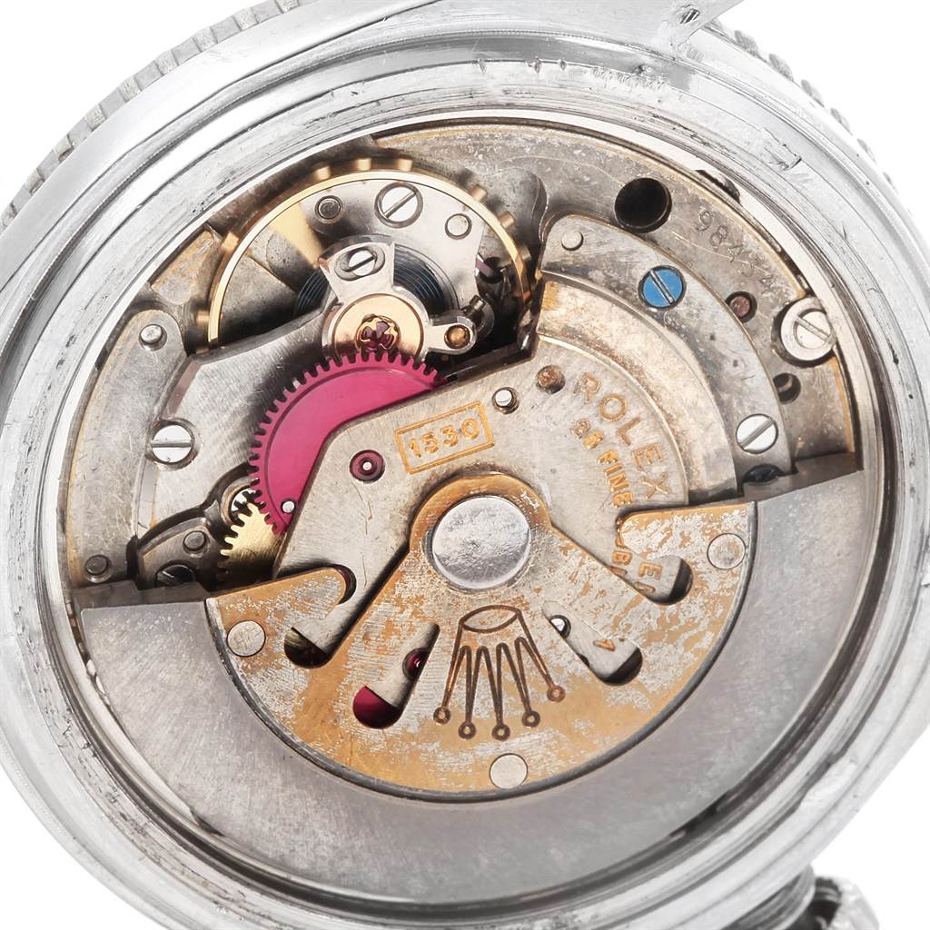 This close-up image showcases the intricate internal mechanism of a Rolex Vintage Collection 5508 Men's Stainless Steel Black Dial 5508 Men's Stainless Steel Black Dial watch.