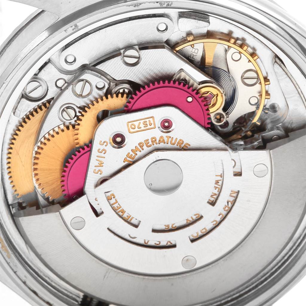 This close-up image shows the intricate inner mechanics of the Rolex Vintage Collection 1603 Men's Stainless Steel Silver Dial 1603 Men's Stainless Steel Silver Dial watch.