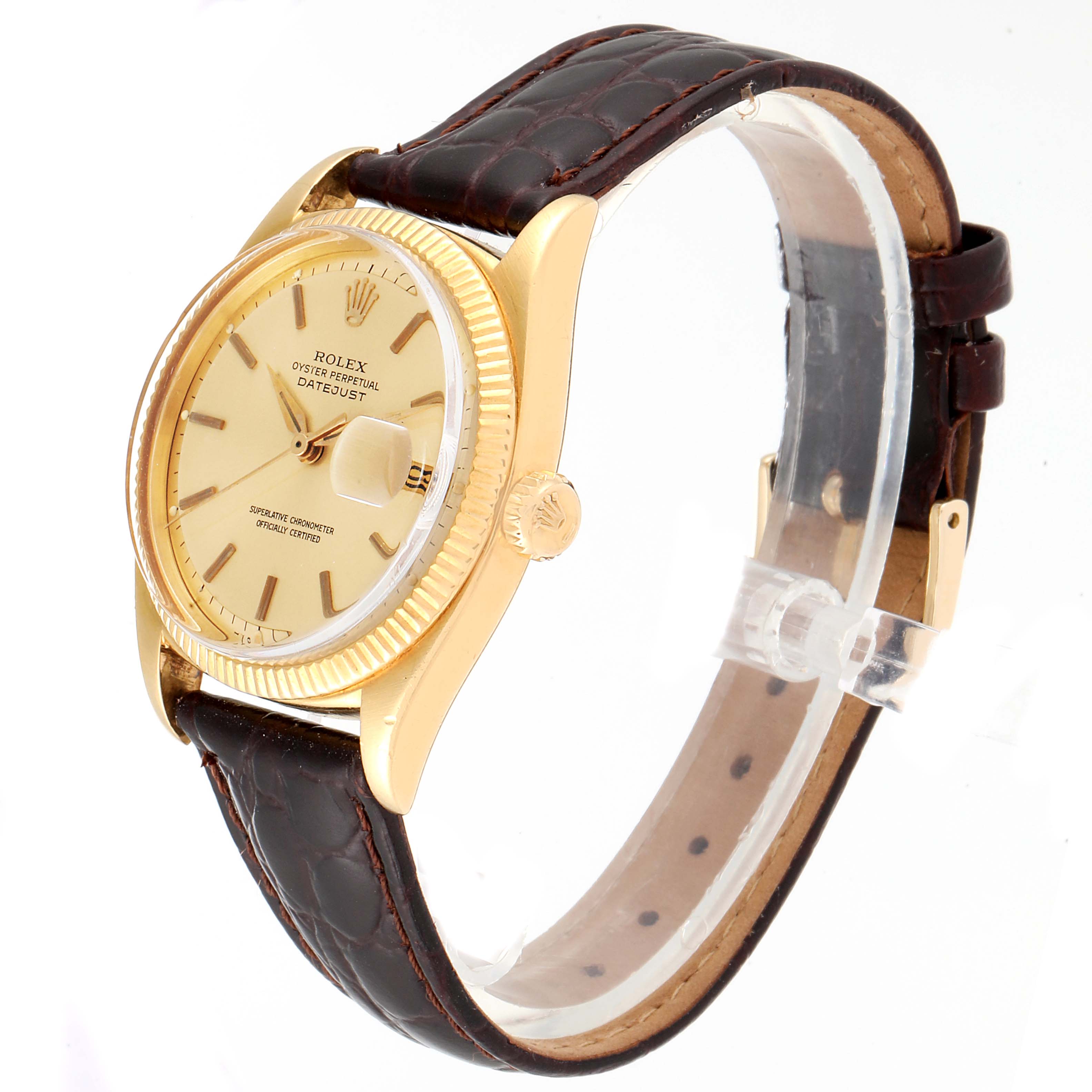 The image shows a Rolex Vintage Collection 6605 Men
s Yellow Gold Champagne Dial 6605 Men
s Yellow Gold Champagne Dial model watch from an angled side view highlighting the face, bezel, crown, and leather strap.