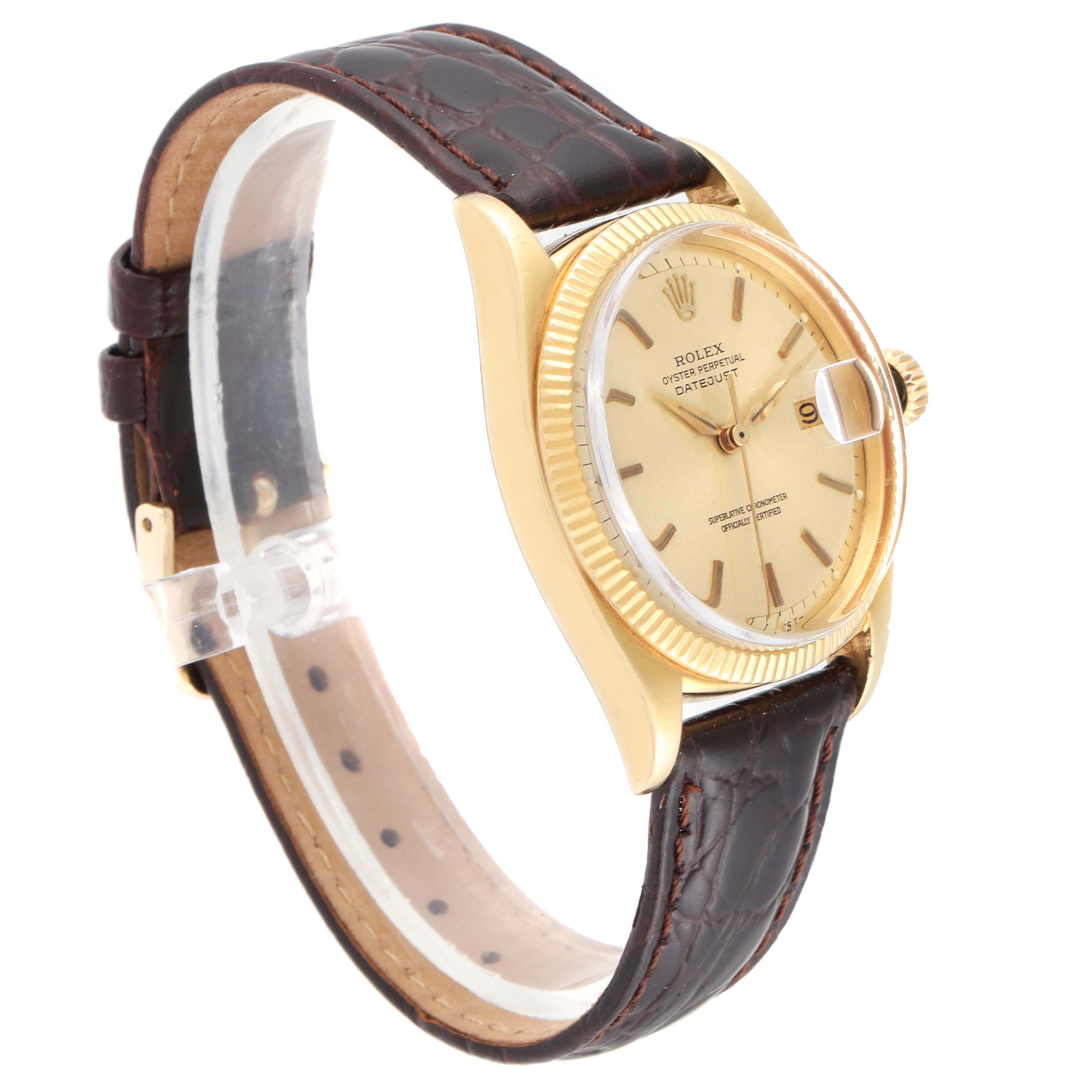 This image shows a side angle view of a Rolex Vintage Collection 6605 Men
s Yellow Gold Champagne Dial 6605 Men
s Yellow Gold Champagne Dial watch, featuring its brown leather strap, gold casing, and face.