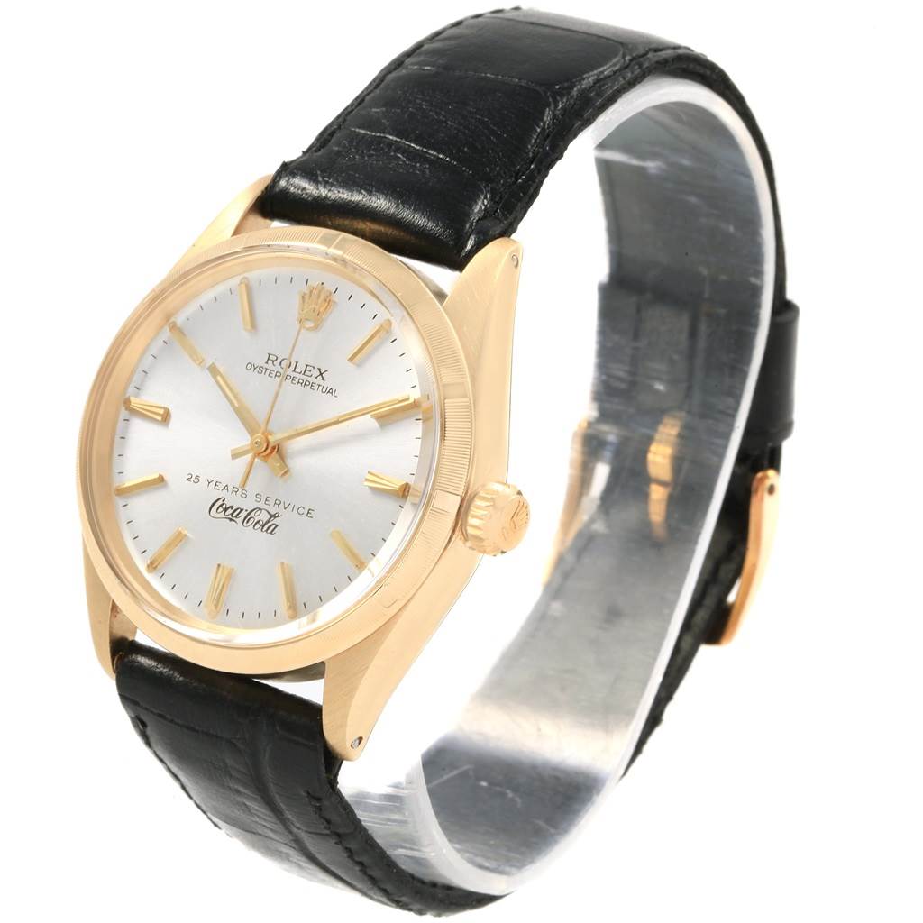 The Rolex Vintage Collection 1003 Men's Yellow Gold Silver Dial 1003 Men's Yellow Gold Silver Dial model is shown at a three-quarter angle, featuring the watch face, gold casing, crown, and black leather strap.